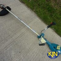 Strimmer with Helmet and Ear Defenders